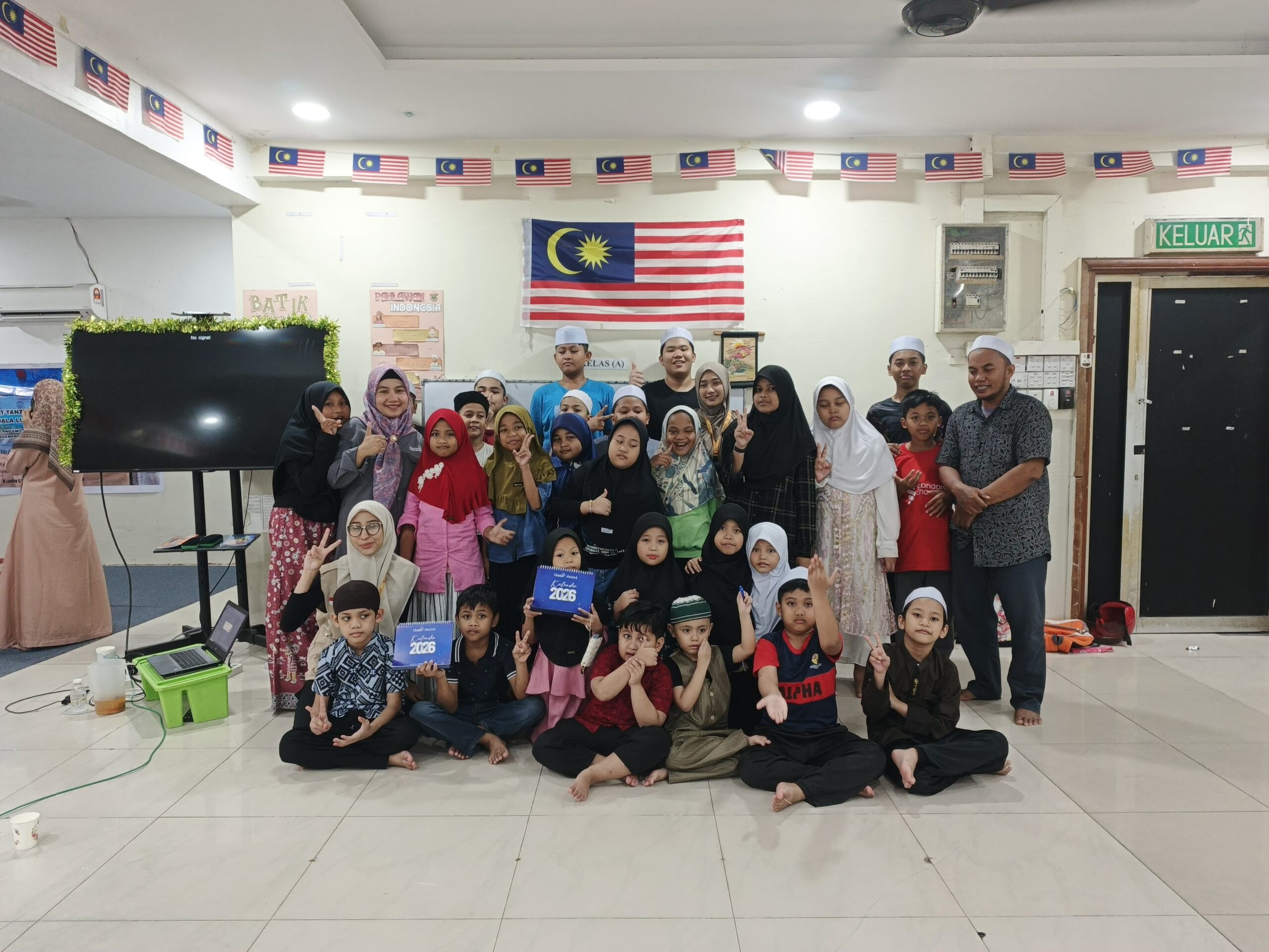 abdimas kepada peserta didik sb at tanzil malaysia